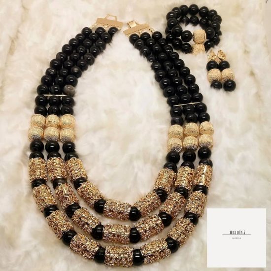 Triple strand black onyx with gold long jewellery set
