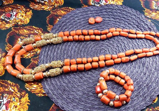 Double long smooth coral with gold accessories