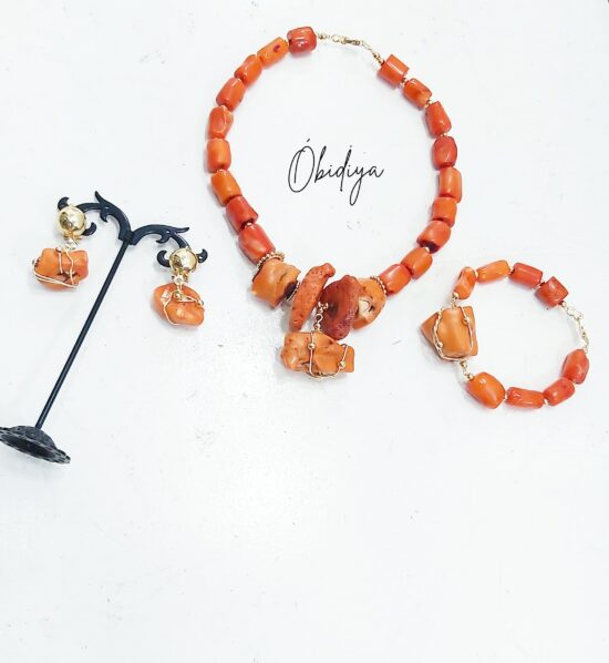 Singke strand orange wired coral with gold accessories